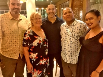 Miembronan di Fundacion Cinearuba a disfruta di nan Christmas dinner